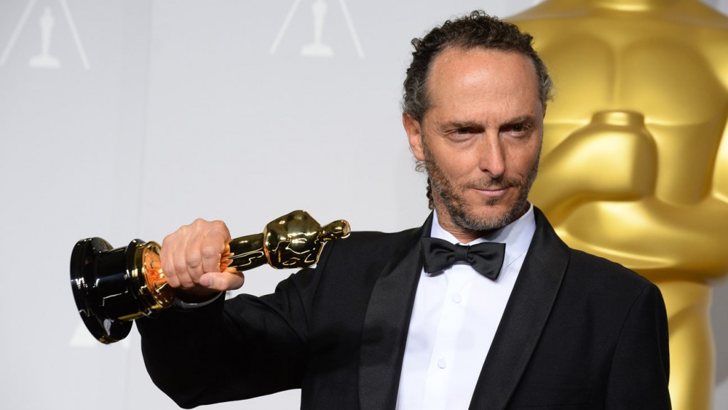 Emmanuel Lubezki poses in the press room with the award for best cinematographer of the year for "Gravity" during the Oscars at the Dolby Theatre on Sunday, March 2, 2014, in Los Angeles.  (Photo by Jordan Strauss/Invision/AP)